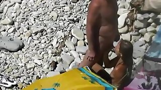 Nudist blows her standing man's penis