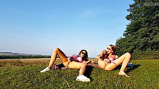 Two Sexy Teens Masturbate Together On The Grass